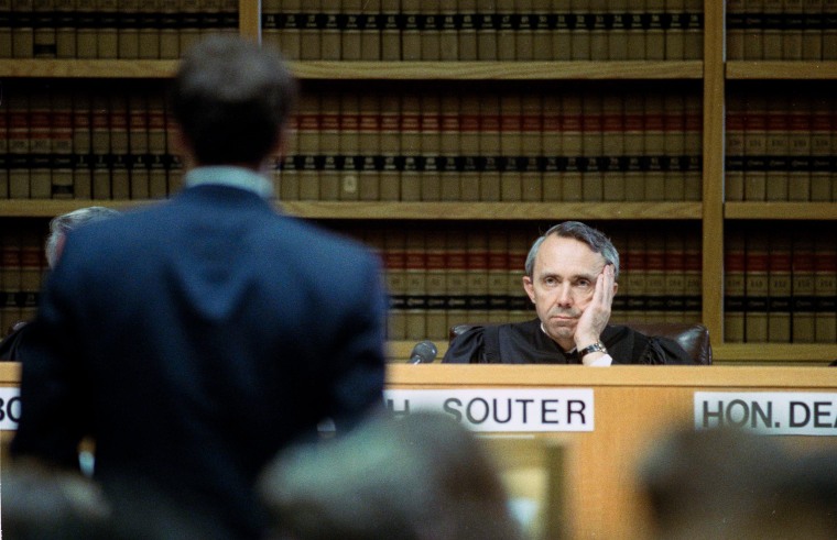 Supreme Court Justice David Souter listens to opening comments during the 80th session of the Ames Moot Court final competition at Harvard University in Cambridge, Mass. on Nov. 21, 1991.