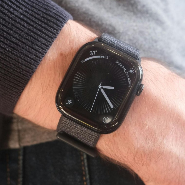 A close up image of an Apple Watch Series 10 on the wrist of the writer.