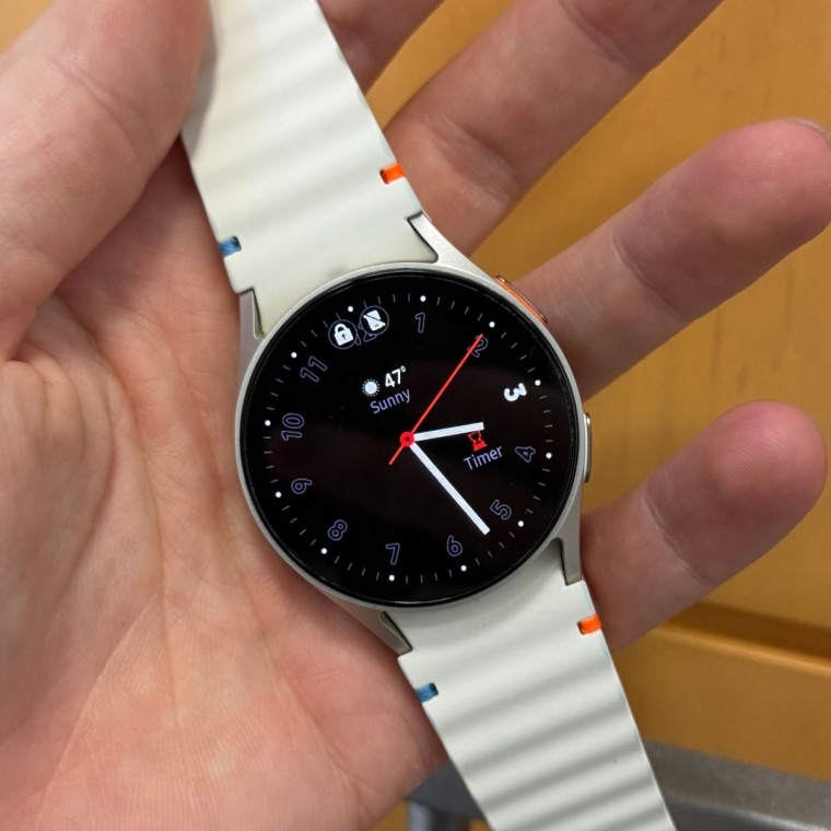 A close up of the Samsung Galaxy Watch 7 with an analog-inspired watch face.