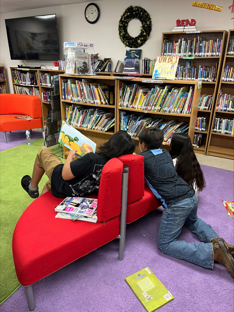 Children reading in the Santa Clara Pueblo Community Library.