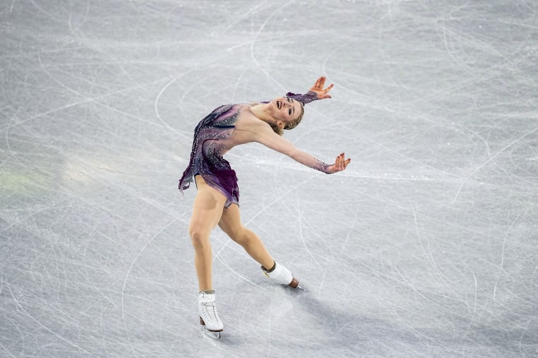 Amber Glenn skates on the ice