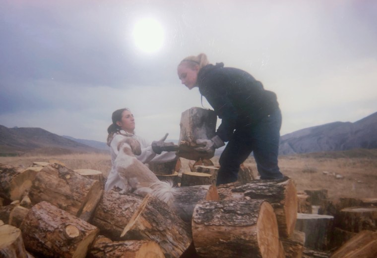 Participants lift lumber at Trinity Teen Solutions in 2011.