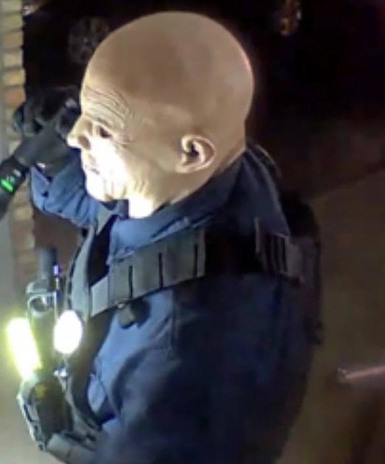 Footage shows a man matching the description of shooting suspect Vance Luther Boelter attempting to gain access to one of the victims' homes.
