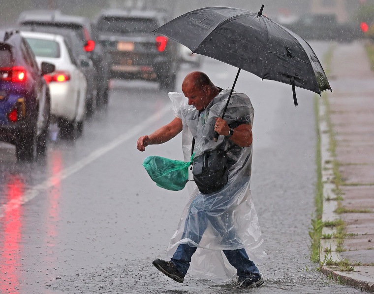 Heavy rain during morning commute floods I-93, temporarily closes part of Red Line, and prompts flash flood warnings