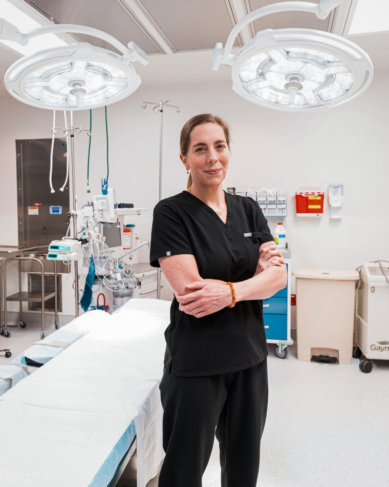 Elisabeth Potter stands in a hospital room